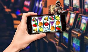 Antarmuka aplikasi pesonawin menampilkan meja live-dealer dan pasar sportsbook
